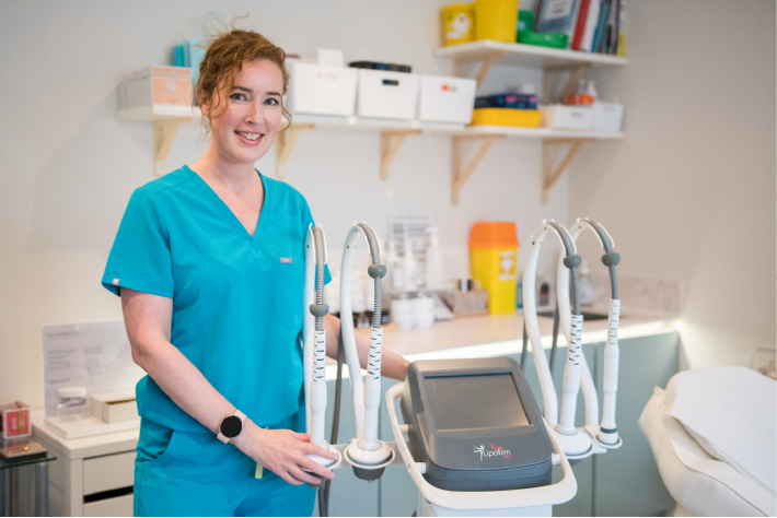 Laura performing an advanced skin treatment