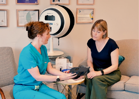 Laura providing a personalised skin consultation to a client in her professional clinic